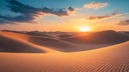 Sunset over rolling sand dunes in a desert landscape. (1)