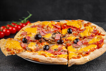 Pizza ham, mushrooms, olives, cheese appetizer vegetable dish fresh gourmet food background on the table rustic food top view copy space