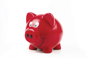 Red piggy bank on white background. Finance Savings and money wealth concept.