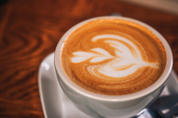 Coffee mug with a pattern on the foam surface
