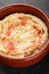 Hummus chickpea dip spices tasty appetizer vegetable dish fresh gourmet vegetarian and vegan food...