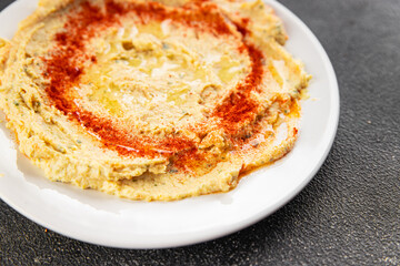 Hummus chickpea dip spices tasty appetizer vegetable dish fresh gourmet vegetarian and vegan food...