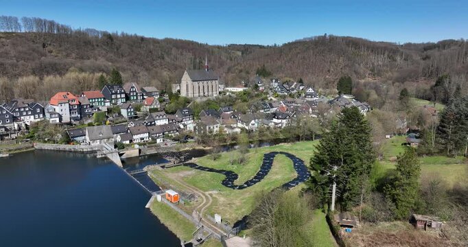 Wuppertal, Beyenburger Stausee, St. Maria Magdalena, church, iconic lake and begining of the Wupper river. Historical village, Aerial view.