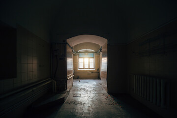Inside old Asylum for the insane. Dark creepy abandoned mental hospital