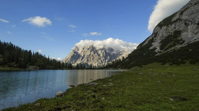 Time lapse of high mountain lake Seebensee and Zugspitze mountain in Tyrol, Austria, high definition clip