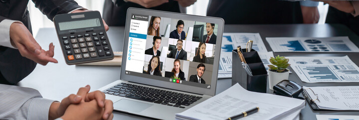 Business people on video conference for brisk virtual group meeting of corprate business office...