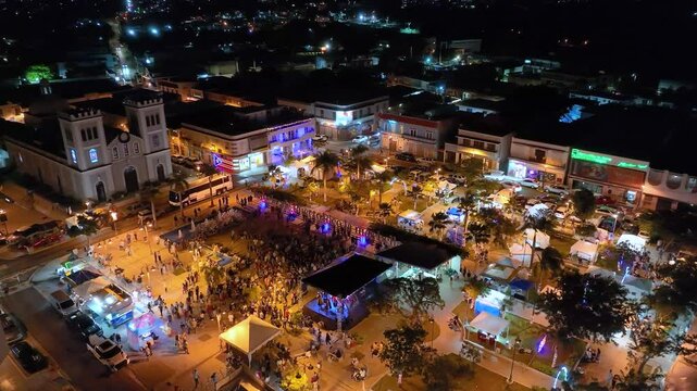Panning and rotating aerial footage of the celebrations and festivities in Isabela, Puerto Rico