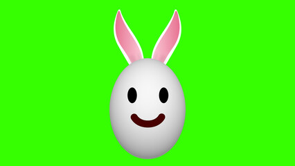 smiley face easter egg on green screen. concept for easter holiday celebration with fun and joy.