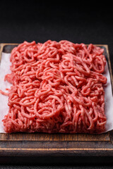 Ground beef mince fresh raw with salt and spices