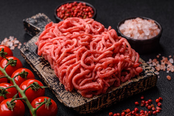 Ground beef mince fresh raw with salt and spices