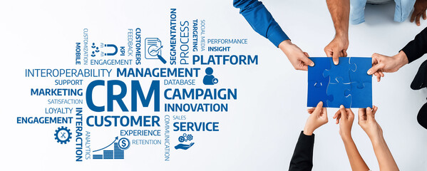 A vibrant illustration showcasing hands collaborating over a puzzle piece surrounded by key business concepts like CRM and campaign management in a modern office environment. Amity