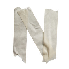 Letter N made of off-white color masking tape