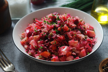A bowl with Vinegret salad, a typical Russian dish	