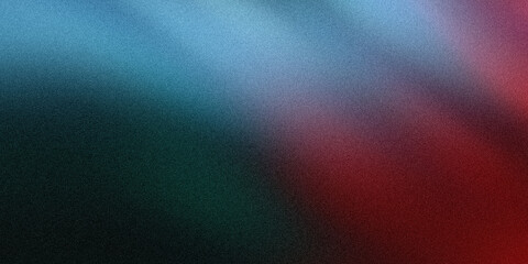 Abstract gradient background with blended hues of blue green and red color transitions smoothly across frame