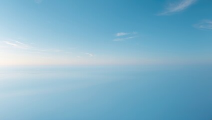 Obraz premium Soft white clouds on a blue sky background with space available for design.