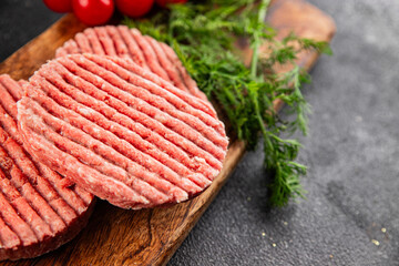Raw meat cutlet pork beef meat dish organic fresh tasty gourmet food background on the table rustic food top view copy space