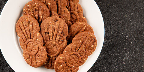 Cookie chocolate nuts sweet cereal dessert organic fresh tasty gourmet food background on the table rustic food top view copy space