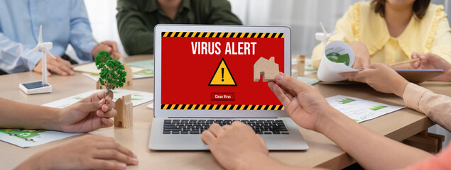 Virus warning alert on computer screen detected brisk cyber threat , hacker, computer virus and...