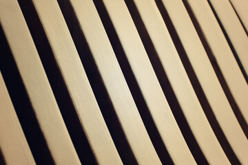 Wooden backgrounds. Wooden curved planks. Wavy texture of veneer.