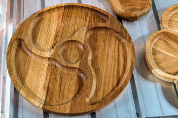 An empty round wooden menagerie.