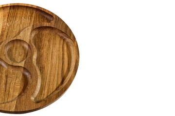 An empty round wooden menagerie.