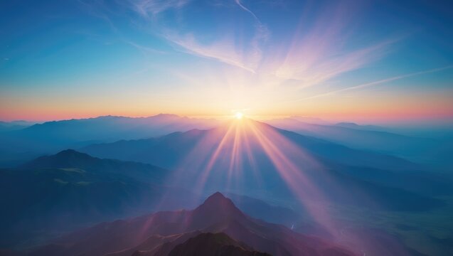First sunbeam at sunrise in the mountains.