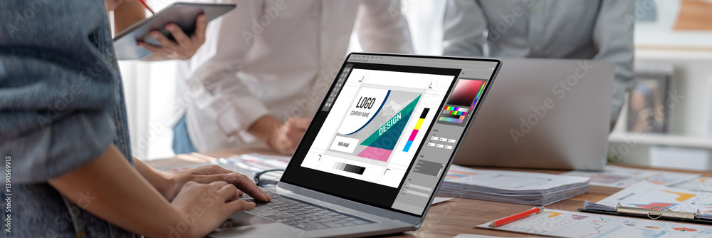 Poster Graphic designer software for modern design of web page and commercial brisk ads showing on the computer screen