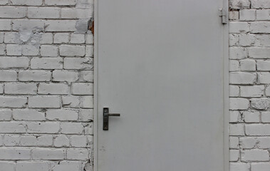 Door Handle On Mortise Lock On Door Mounted Into Solid Brick Wall. Illustrative Photo Of Home Security