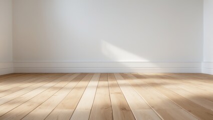Wooden flooring alongside a white wall and floor skirting.