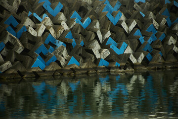 concrete breakwaters on the shore
