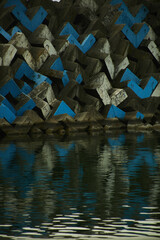 concrete breakwaters on the shore