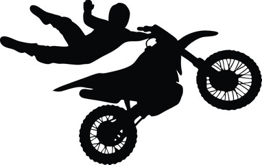 Fototapeta premium A black silhouette of a freestyle motocross rider jumping their bike