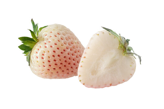 Whole and half white strawberry or pineberry berries isolated on white background.