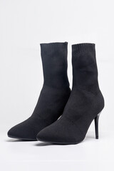 Elegant black sock boots showcasing modern footwear design