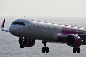 PLANE TAKING OFF AND LANDING FROM THE PLANE, ROLLING ON THE RUNWAY