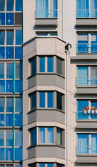 Fototapeta premium Cityscape on a summer day, modern buildings and houses 
