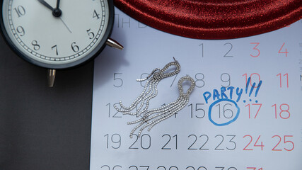 Reminder in the calendar about the appointment to the partyr, highlighted in blue number in the calendar