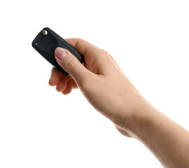 Woman with car key on white background, closeup