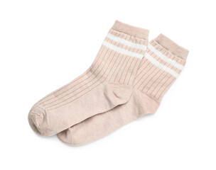 Pair of beige socks isolated on white, top view