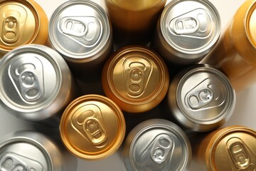 Many different tin cans on white background, flat lay