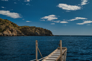 Views from a boat of Cap Norfeu and Cap de Creus: Landscape of the cliffs of the Natural Park Cap de Creus, in the Mediterranean in Roses, Alt Emporda. Costa Brava. Catalonia. Spain 