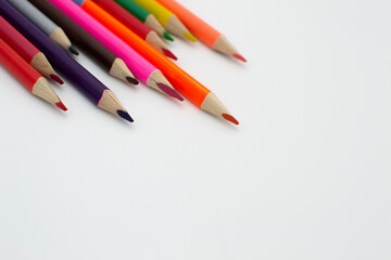 colored pencils on white background