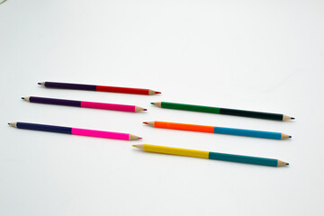 colored markers on white background