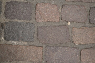 Obraz premium gray paving slabs as a background, pavement paved slabs as a background 