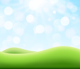 Summer meadow landscape with green hills and blue sky