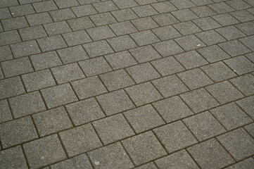 grey paving tile texture, grey tile pattern as background, grey tile texture close up	
