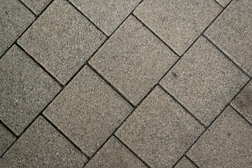 grey paving tile texture, grey tile pattern as background, grey tile texture close up	
