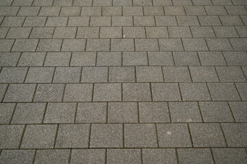grey paving tile texture, grey tile pattern as background, grey tile texture close up	
