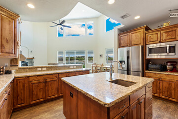 Elegant wooden cabinets and stylish granite countertops in a kitchen