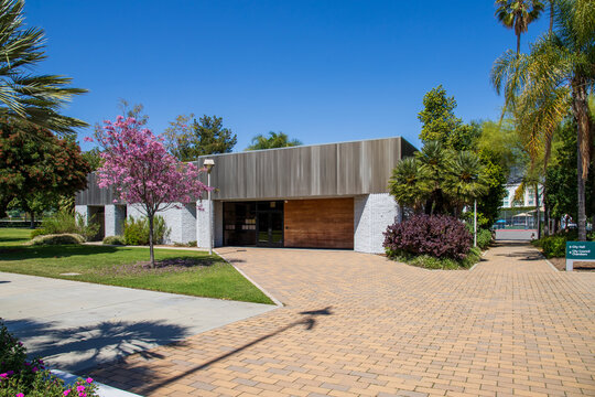 Arcadia City Council Chamber with lush green trees and colorful flowers in Arcadia California USA